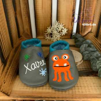 Name mit Farbkleckse und Monsterchen