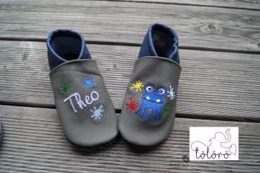 Name mit Farbkleckse und Monsterchen
