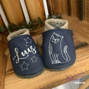 Name mit Pfoten und Katze Tom