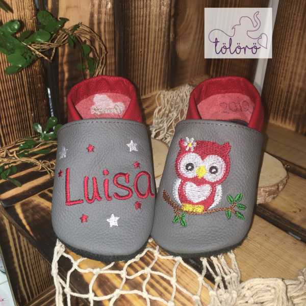 Name mit Blumen und Eule