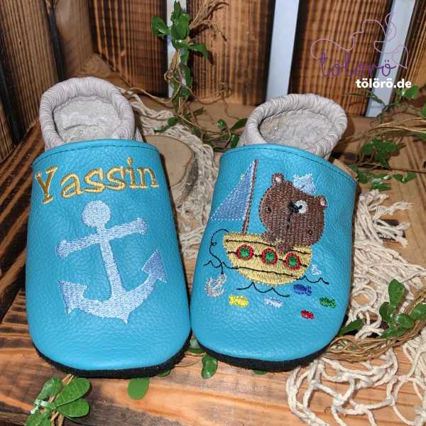 Name mit Anker und Bär mit Boot