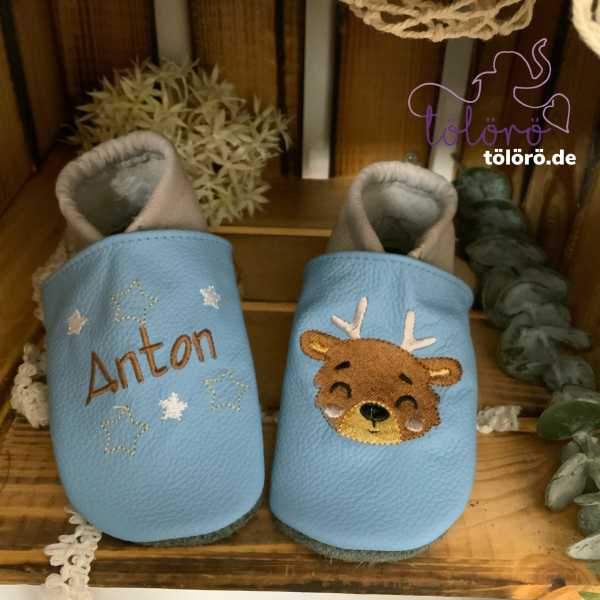 Name mit Sternen und Hirschkopf