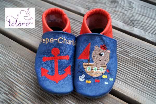Name mit Anker und Bär mit Boot