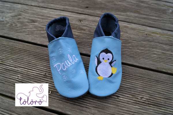 Name mit Schneeflocken und Pinguin