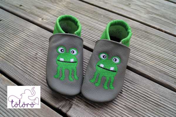 Name mit Farbkleckse und Monsterchen
